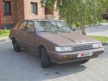 Toyota Camry (CV10, CV11, SV10, SV11) 1 покоління, рестайлінг, лифтбек (1984 - 1986)